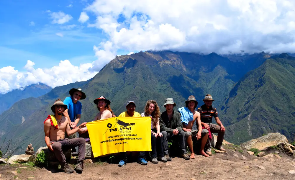 Private trekking group resting during a guided mountain route in Peru