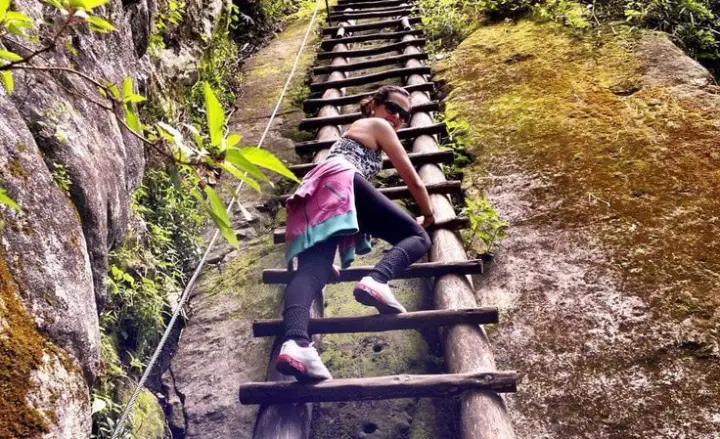 Climbing Putucusi mountain from an uphill staircase