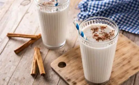Creamy barley water with condensed milk and cinnamon powder.