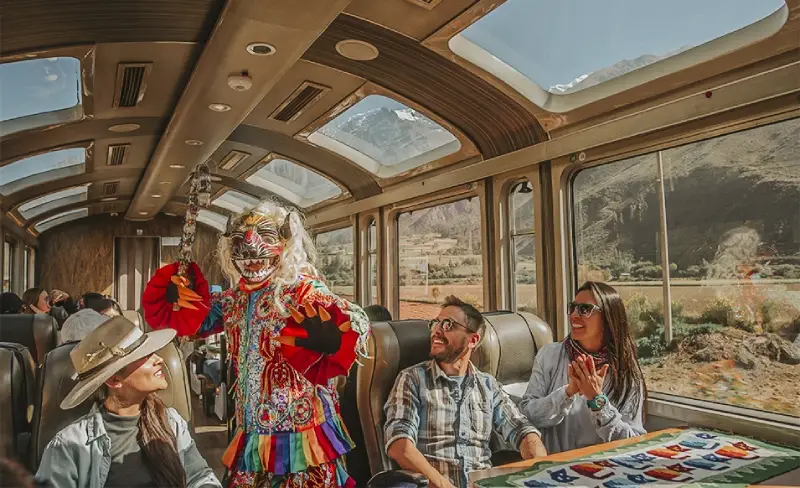Cultural show inside the Vistadome train on the route to Machu Picchu.