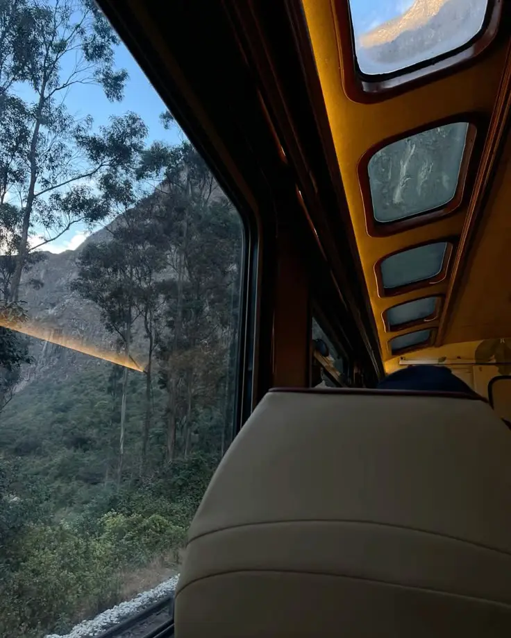 train window rugged mountains