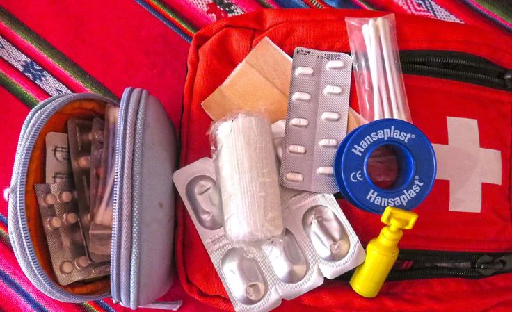 Personal medicines and travel health items packed for a Choquequirao trek altitude sickness, helpful for altitude, blisters, and common issues in Cusco.