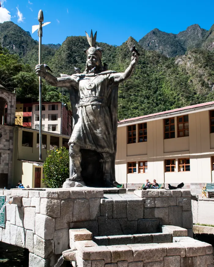 what to do in Aguas Calientes? Peruvian Inca statue at the entrance of Aguas Calientes