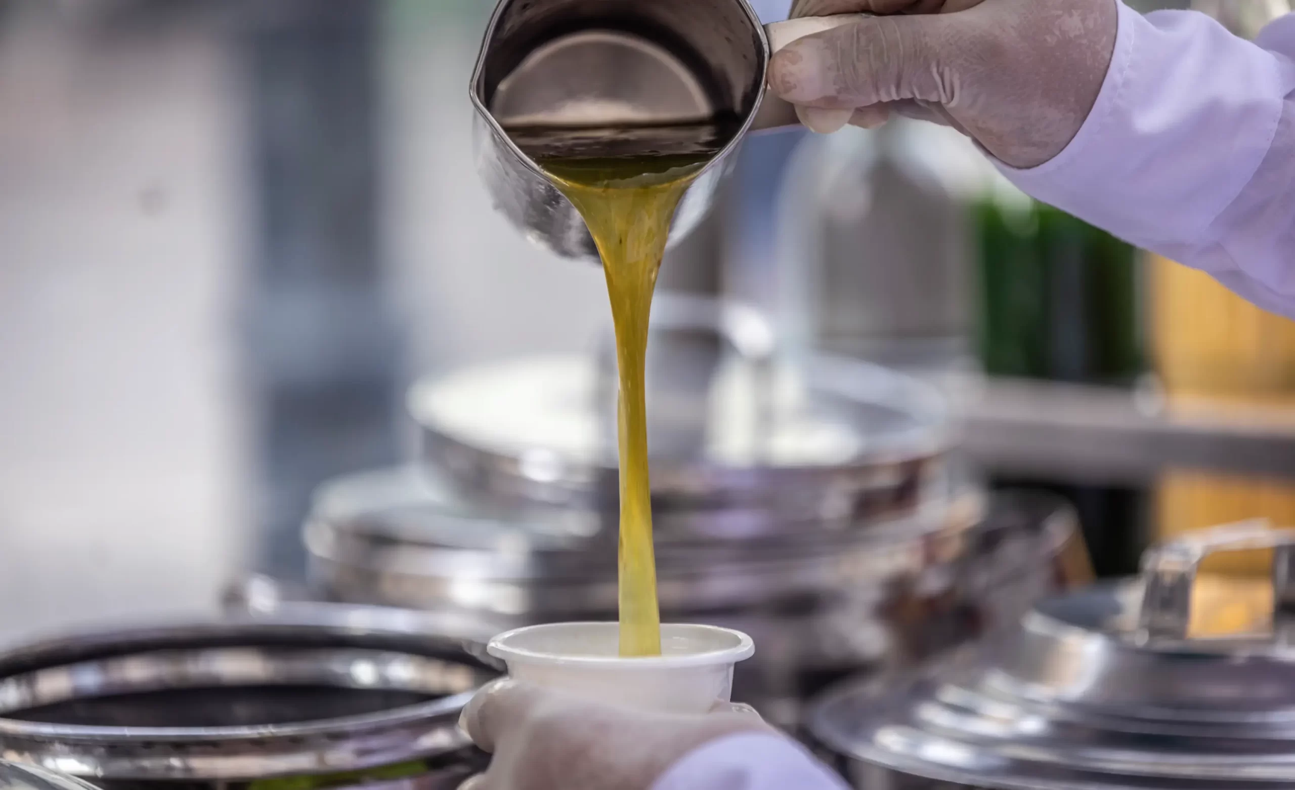Preparation of Emoliente, a traditional Peruvian beverage.