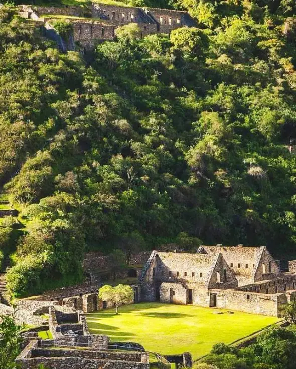 Choquequirao ruins surrounded by vegetation on the classic trekking route