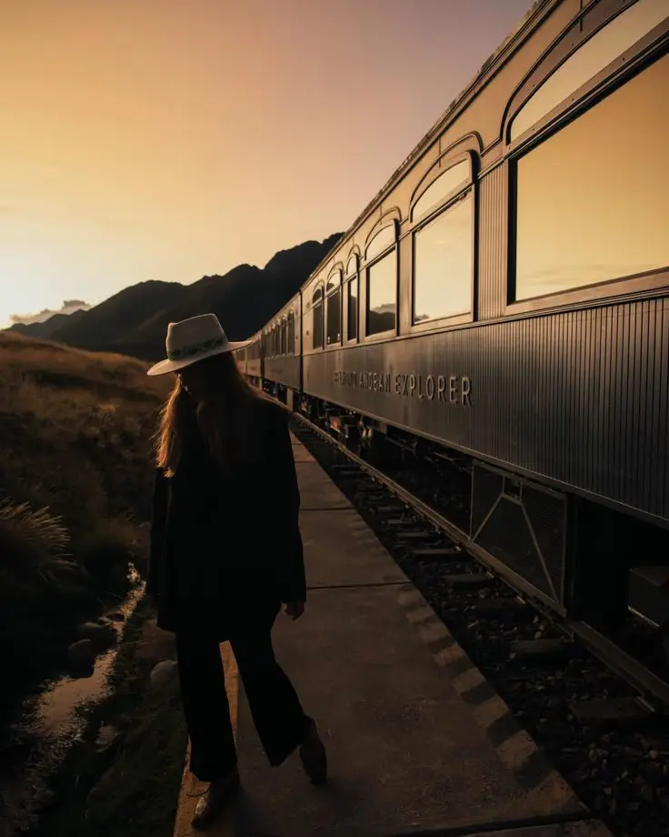 train golden sky mountains