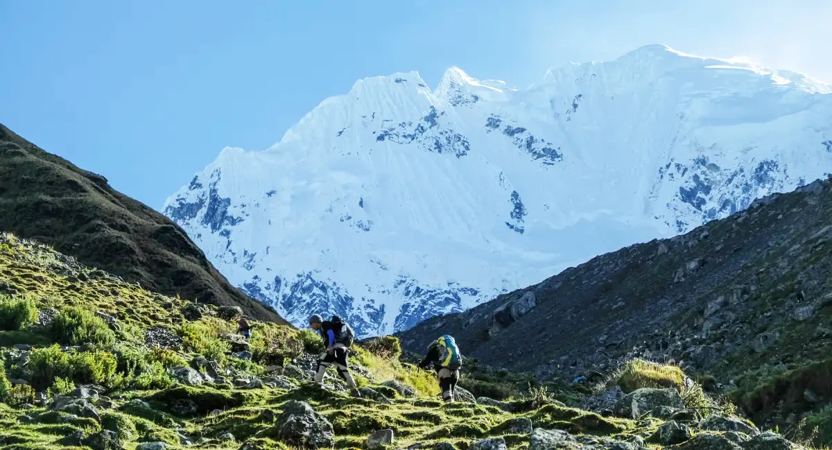 Trekkers beneath Salkantay Mountain before the Incachiriaska section of the combined route