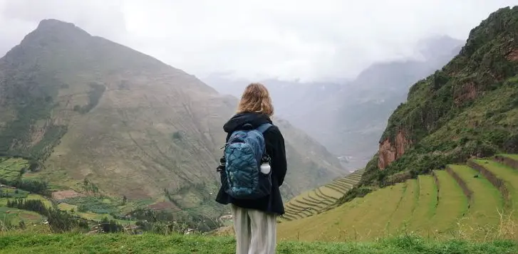 Acclimatization in Cusco, woman looking at the mountain, Peru
