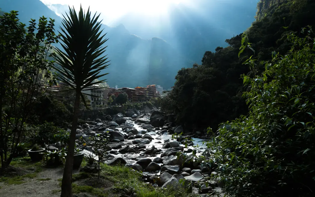 aguas calientes to machu picchu urubamba river stones water light machu picchu pueblo