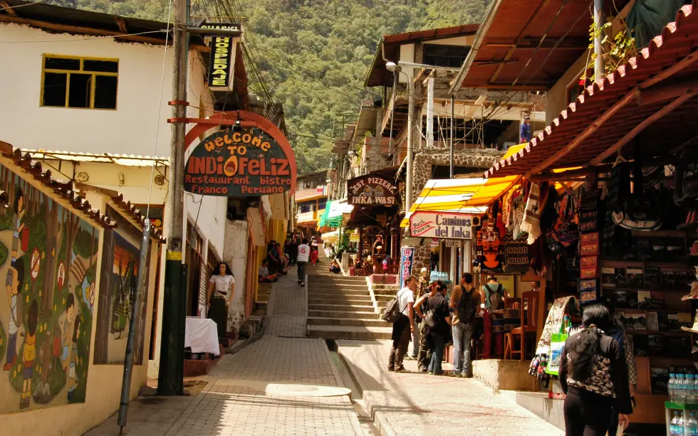 aguas calientes to machu picchu pueblo local shops people tourists residents cusco peru