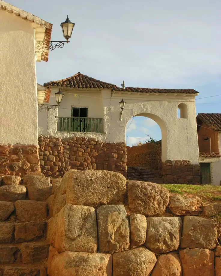visit Chinchero Cusco Peru warm tones stones corner calm climate white house things to do in chinchero