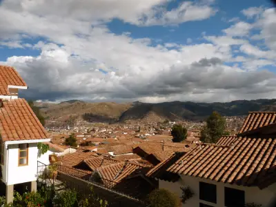 San Blas neighborhood in Cusco under a cloudy sky, Peru