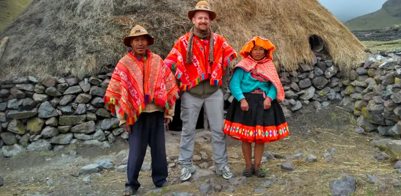 pueblo de cuncani, lares trek│A hiker wearing a poncho typical of the village of Cunkani.
