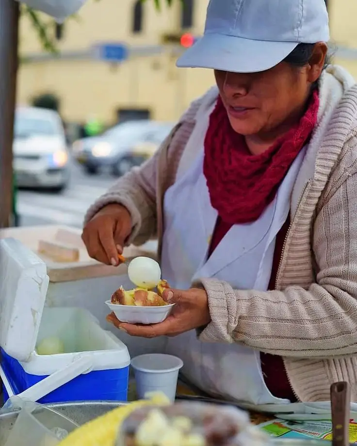 credit cards in peru local stand vendor egg with potato cold street daily life