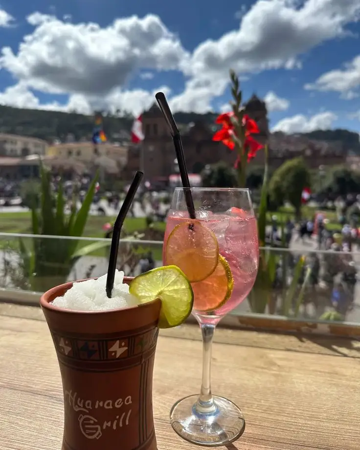 credit cards in peru drinks restaurant plaza de armas cusco sky clouds people