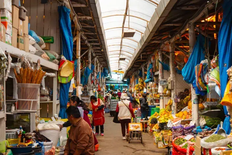 Bustling Aisle Inside Vinocanchon Market – Markets in Cusco Tour (Inkayni Peru Tours)